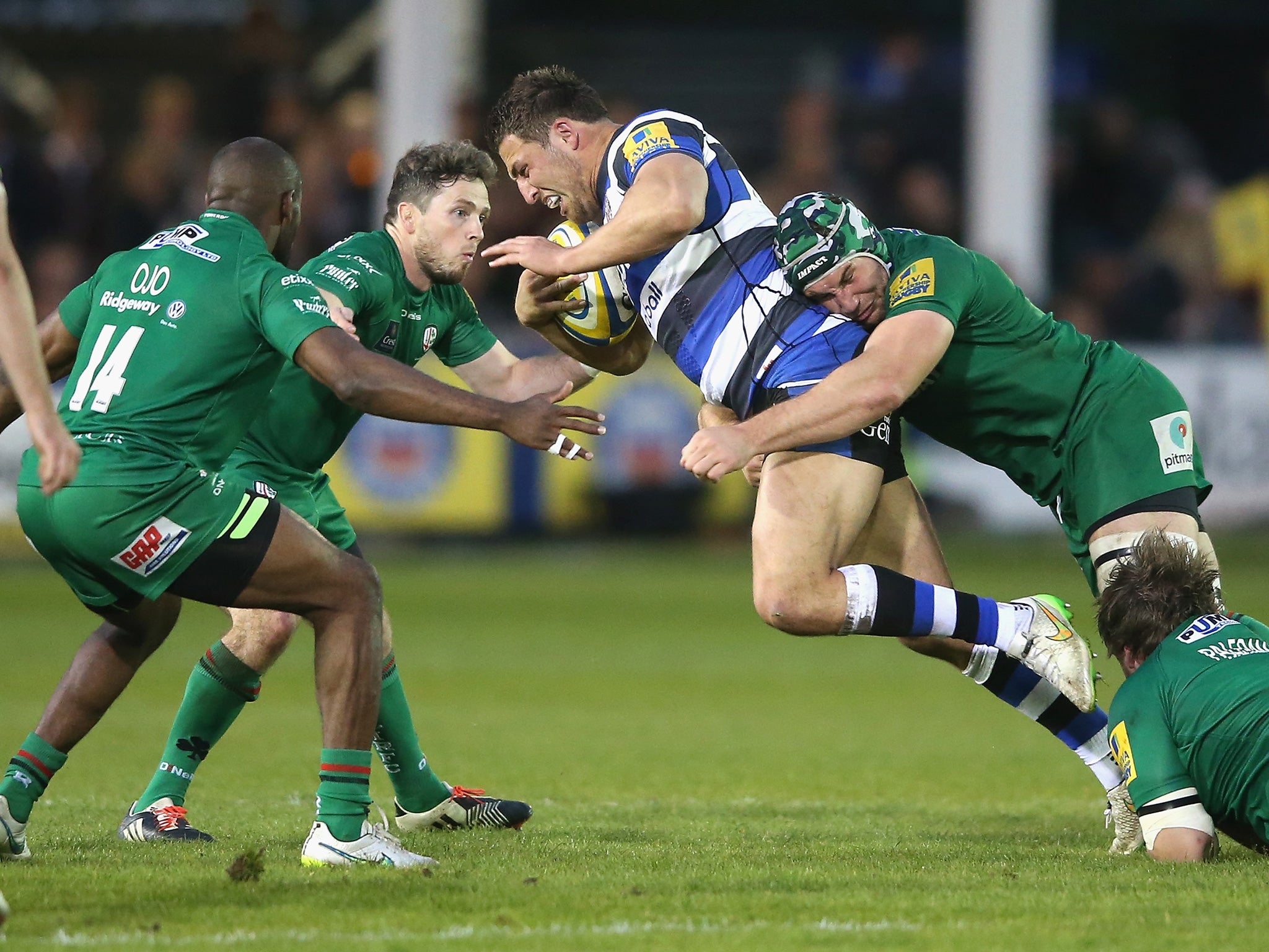 Sam Burgess is stopped by the London Irish defence at the Rec