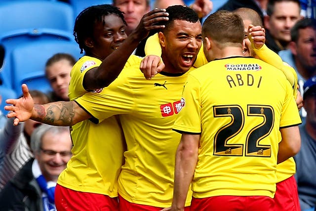 Watford players celebrate after Troy Deeney scored to put the Hornets ahead