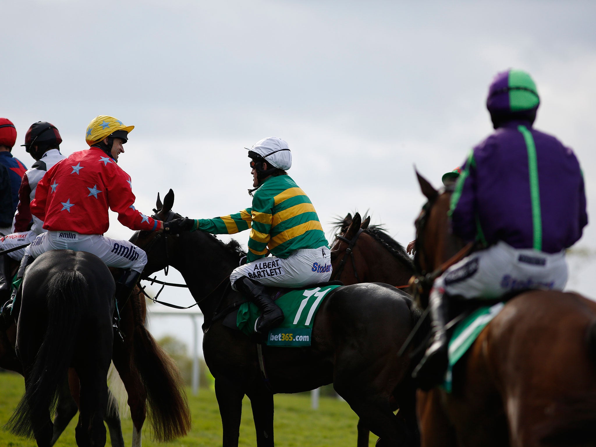 Jockeys congratulate Tony McCoy on his career as he retires from horse racing