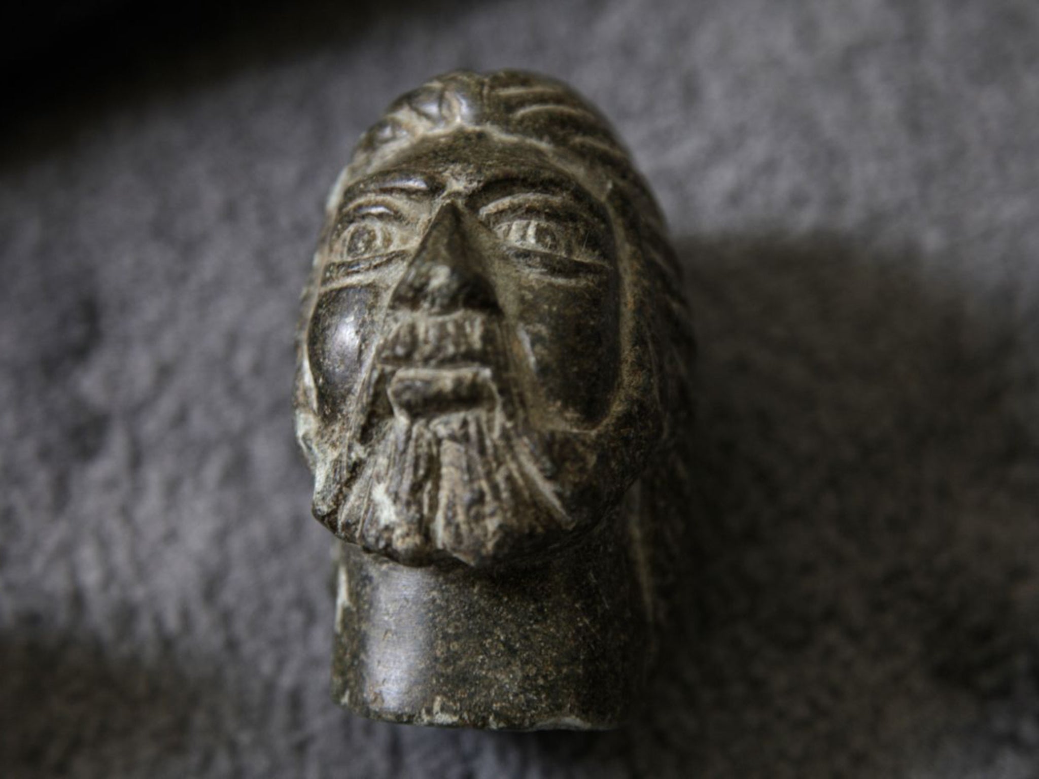 This carved head was one of the items which was smuggled out of Syria and into Turkey