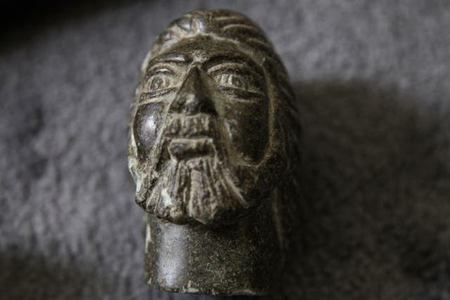 This carved head was one of the items which was smuggled out of Syria and into Turkey