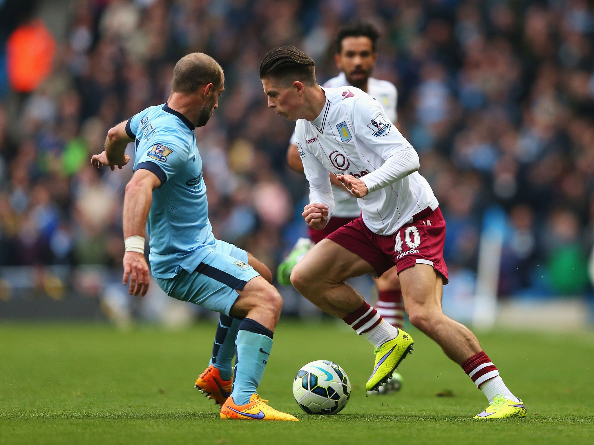 Jack Grealish (right) in action for Villa
