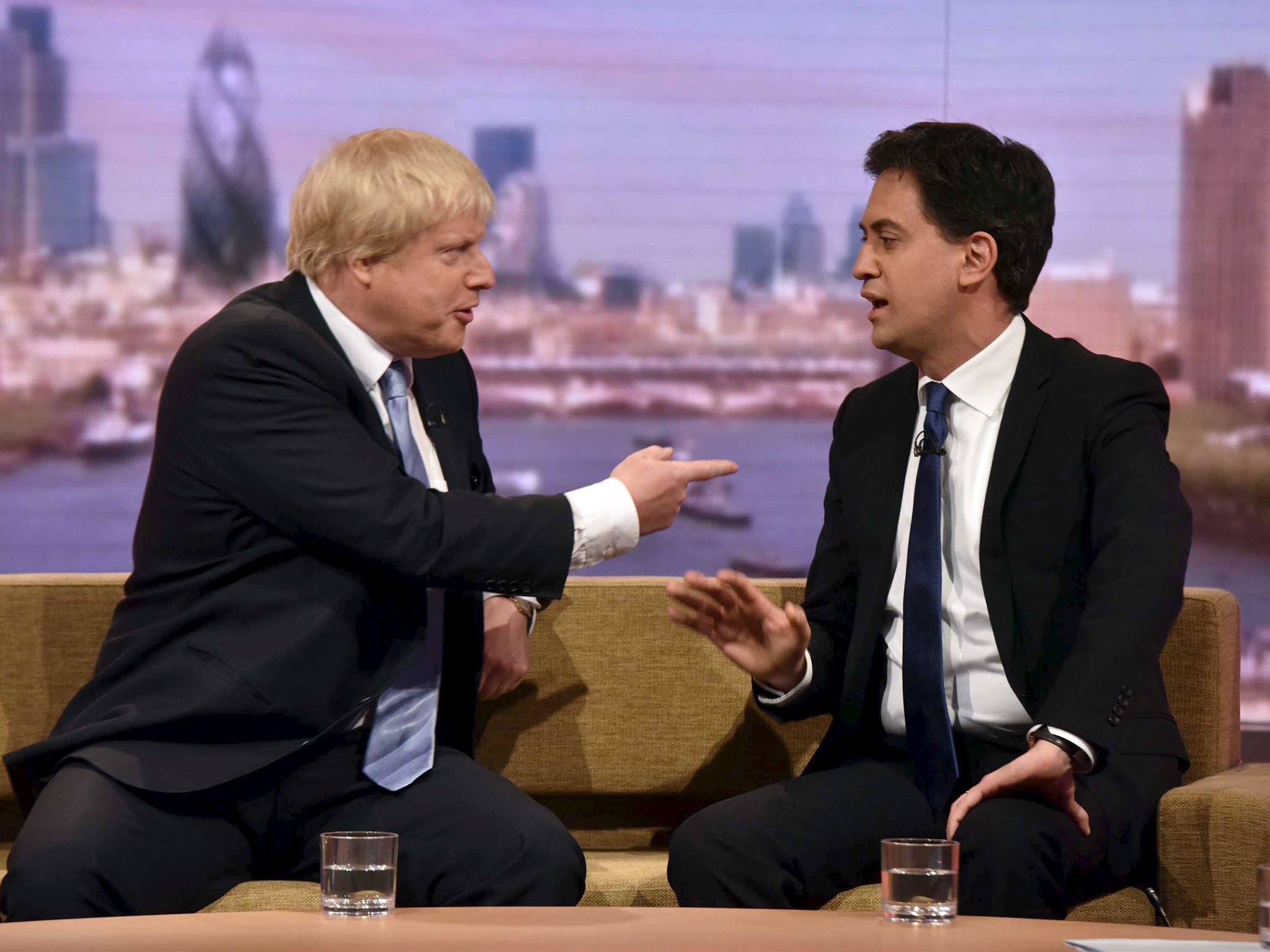 Britain's opposition Labour Party leader Ed Miliband (R) and Boris Johnson, mayor of London, talk on the Andrew Marr show in London April 26