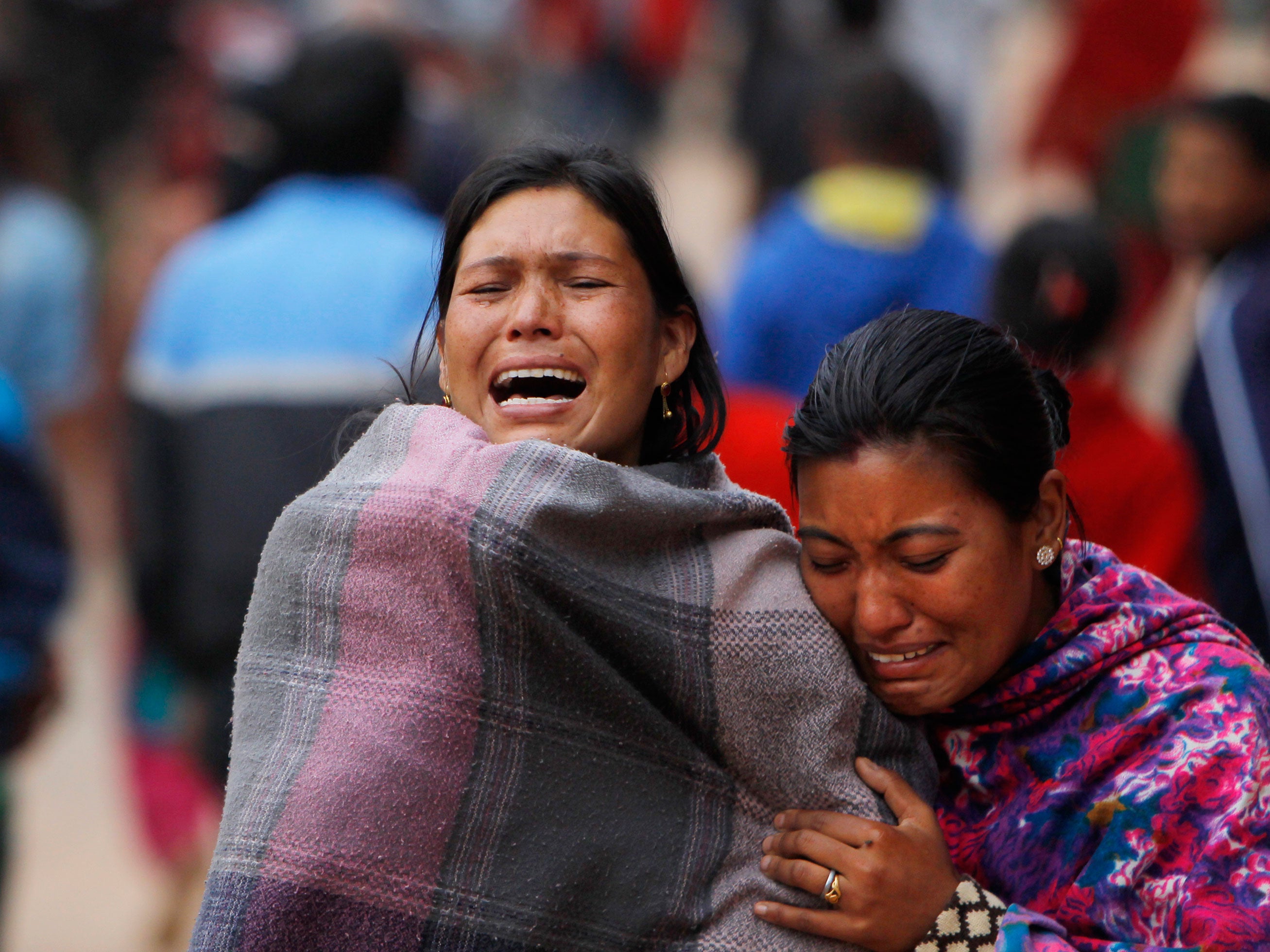 Family members break down during the cremation of an earthquake victim in Bhaktapur