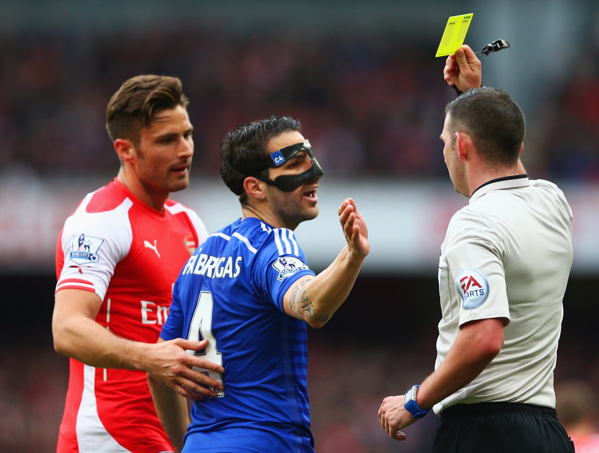 Cesc Fabregas is booked for diving