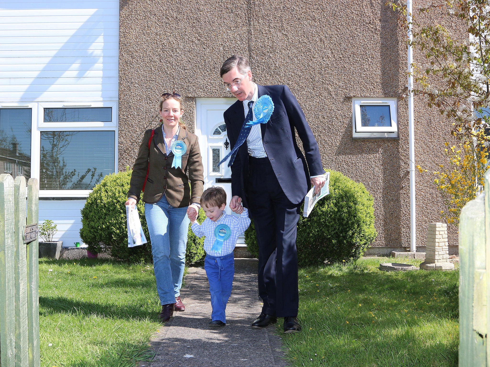 Jacob Rees-Mogg in Temple Cloud, with wife Helena and son Anselm providing support