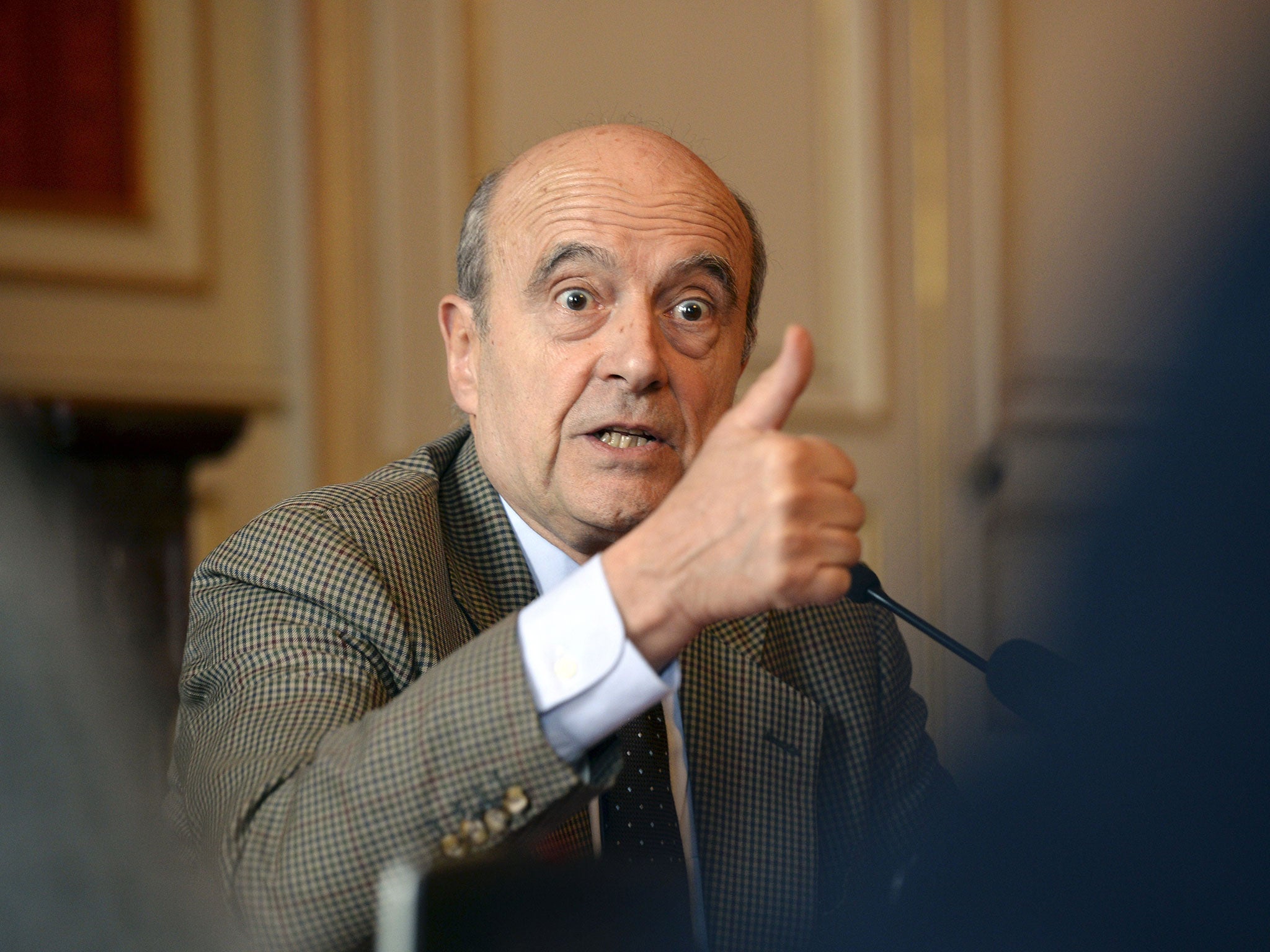 Alain Juppé is concerned the name change would help his political rival