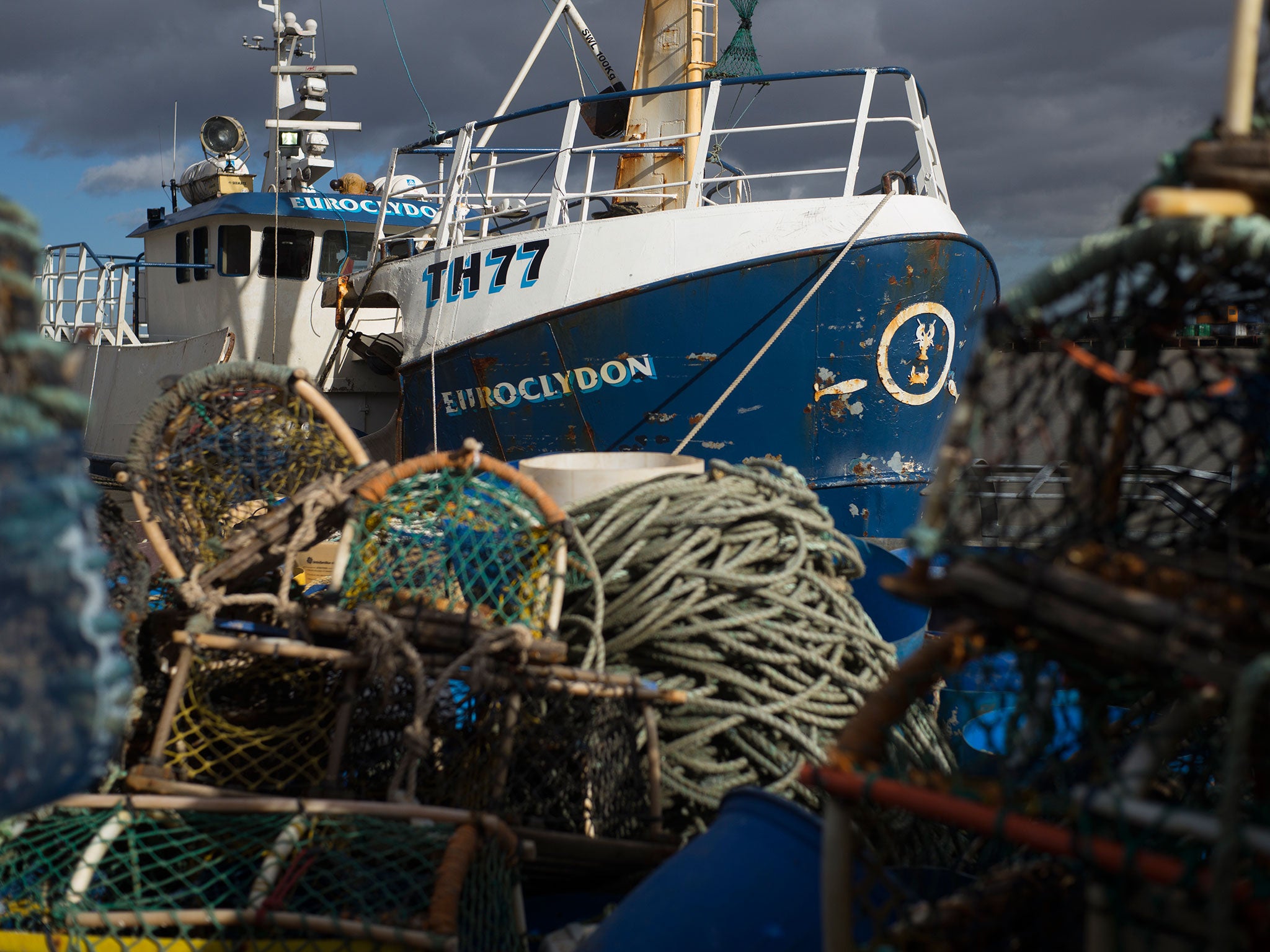 A Grimsby trawler: outside the South-east the economy is weak