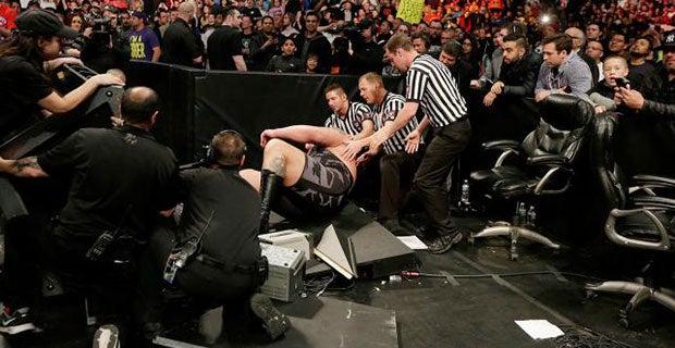 Big Show is speared through the Spanish announcers' table