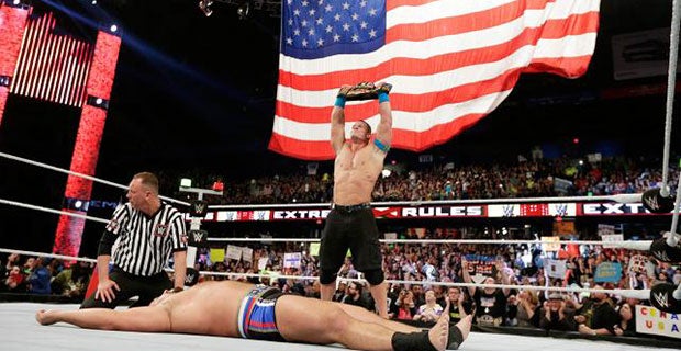 John Cena celebrates his win over Rusev