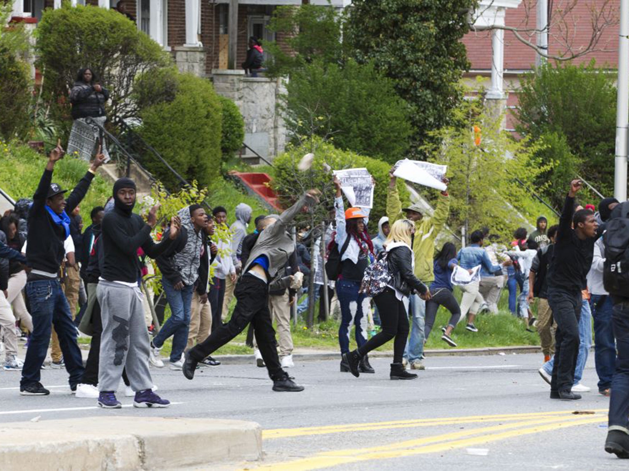 Demonstrators threw rocks and other objects at police following the funeral of Freddie Gray