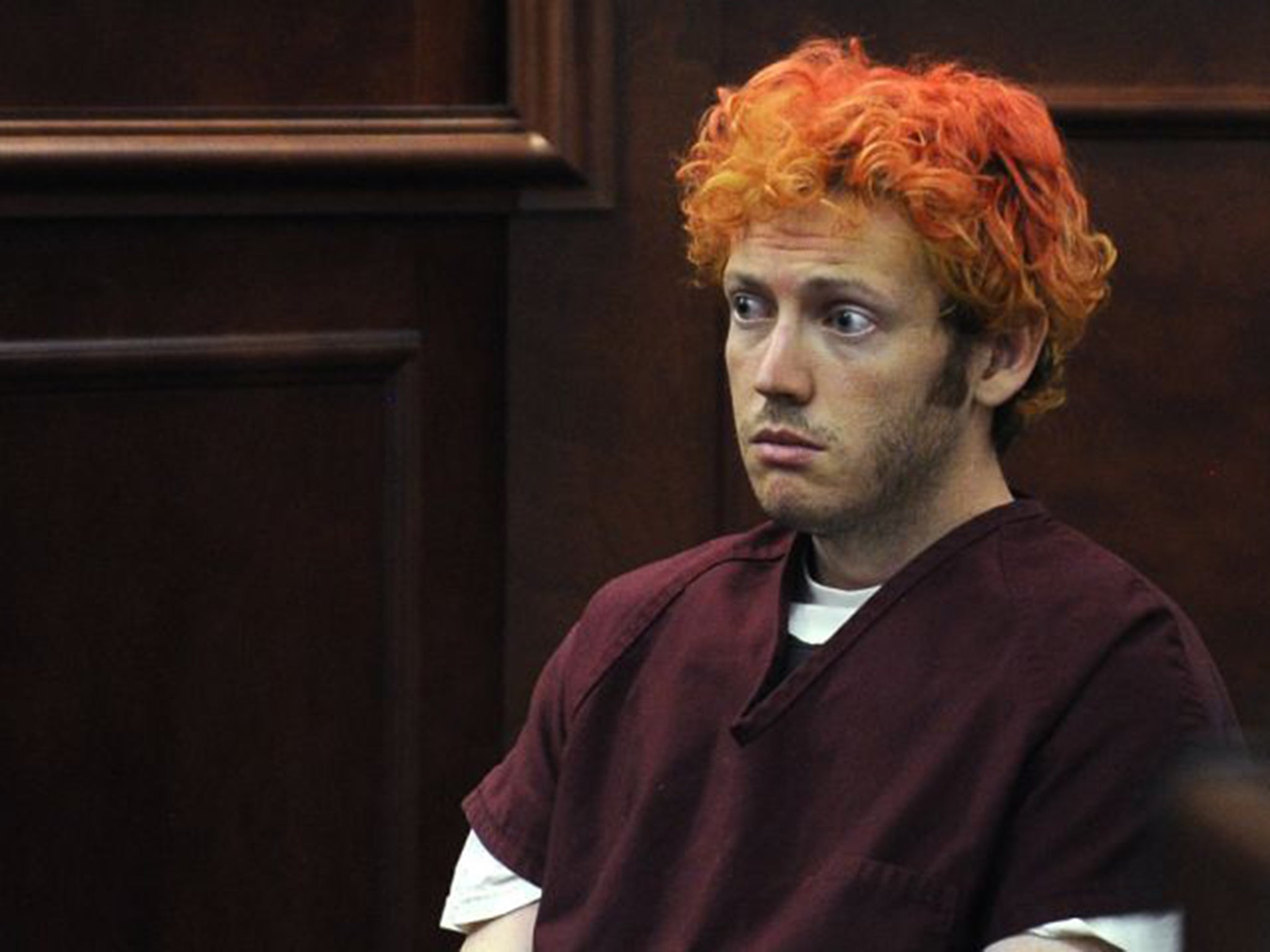 James Holmes’ appearance has changed dramatically since this first court appearance