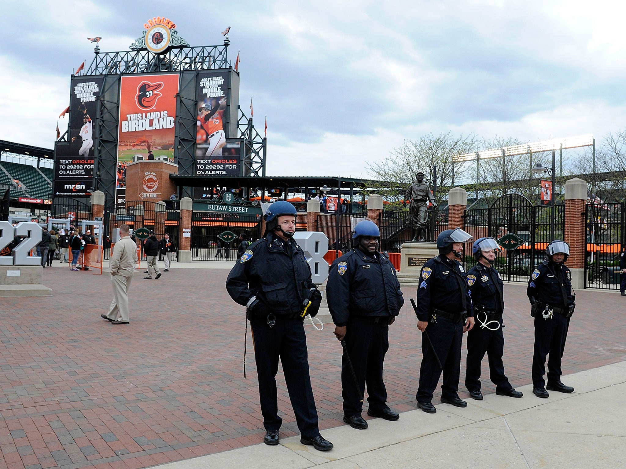 Police stand outside Oriole Park during the Baltimore riots