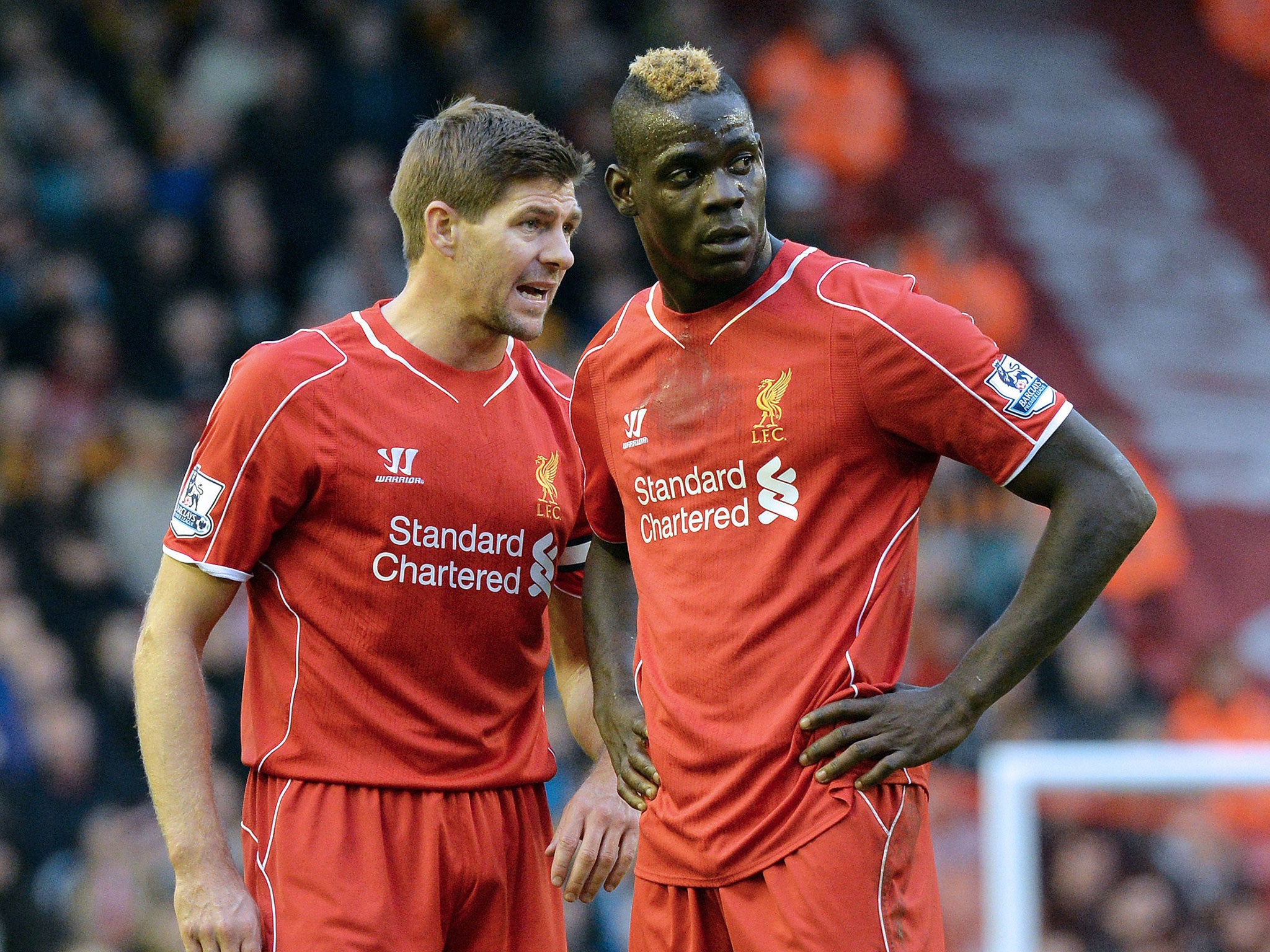 Gerrard talks with Mario Balotelli in the game against Hull earlier this season