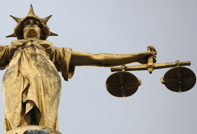 The scales of justice above the Old Bailey