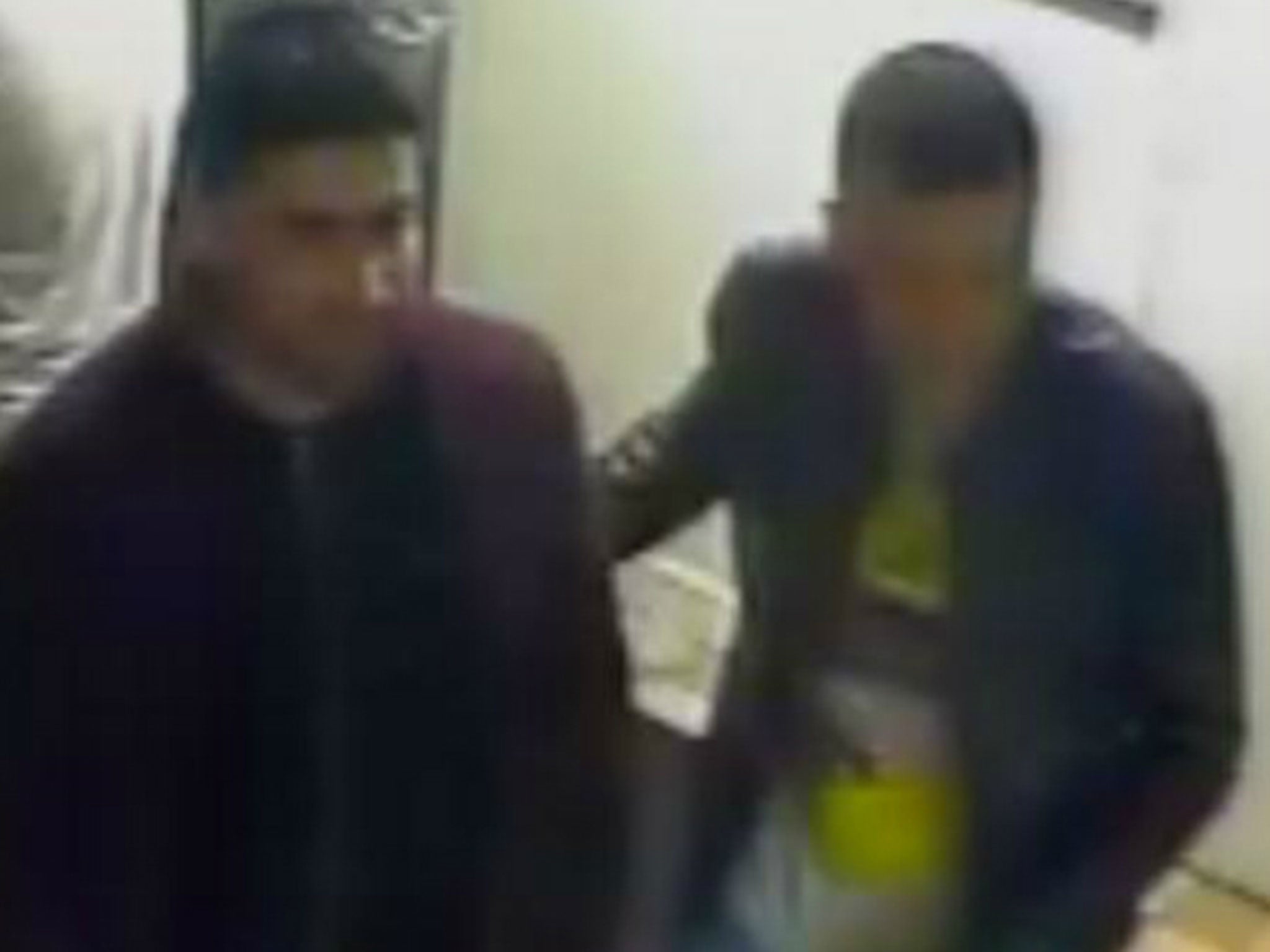 The police want to speak to these two men, seen entering a boxing club in Donnington (Image: West Midlands Police)