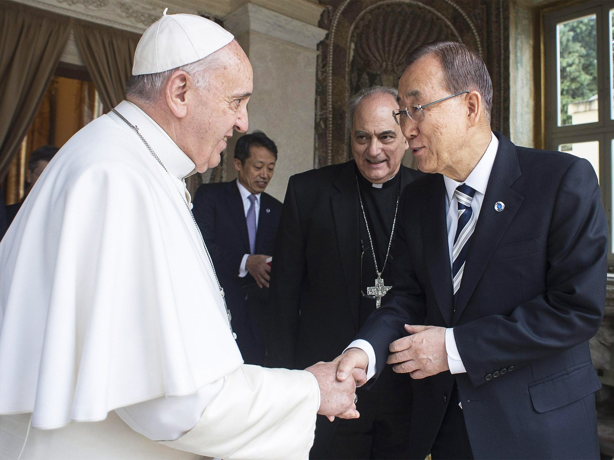Pope Francis greets UN Secretary-General Ban Ki-moon on Wednesday