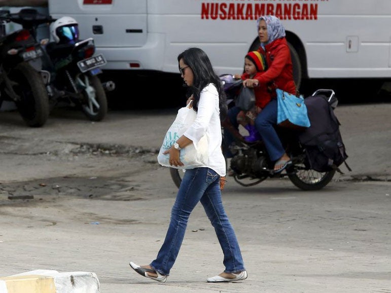 Febyanti Herewila on her way to visit Andrew Chan on Nusakambangan Island on 11 March