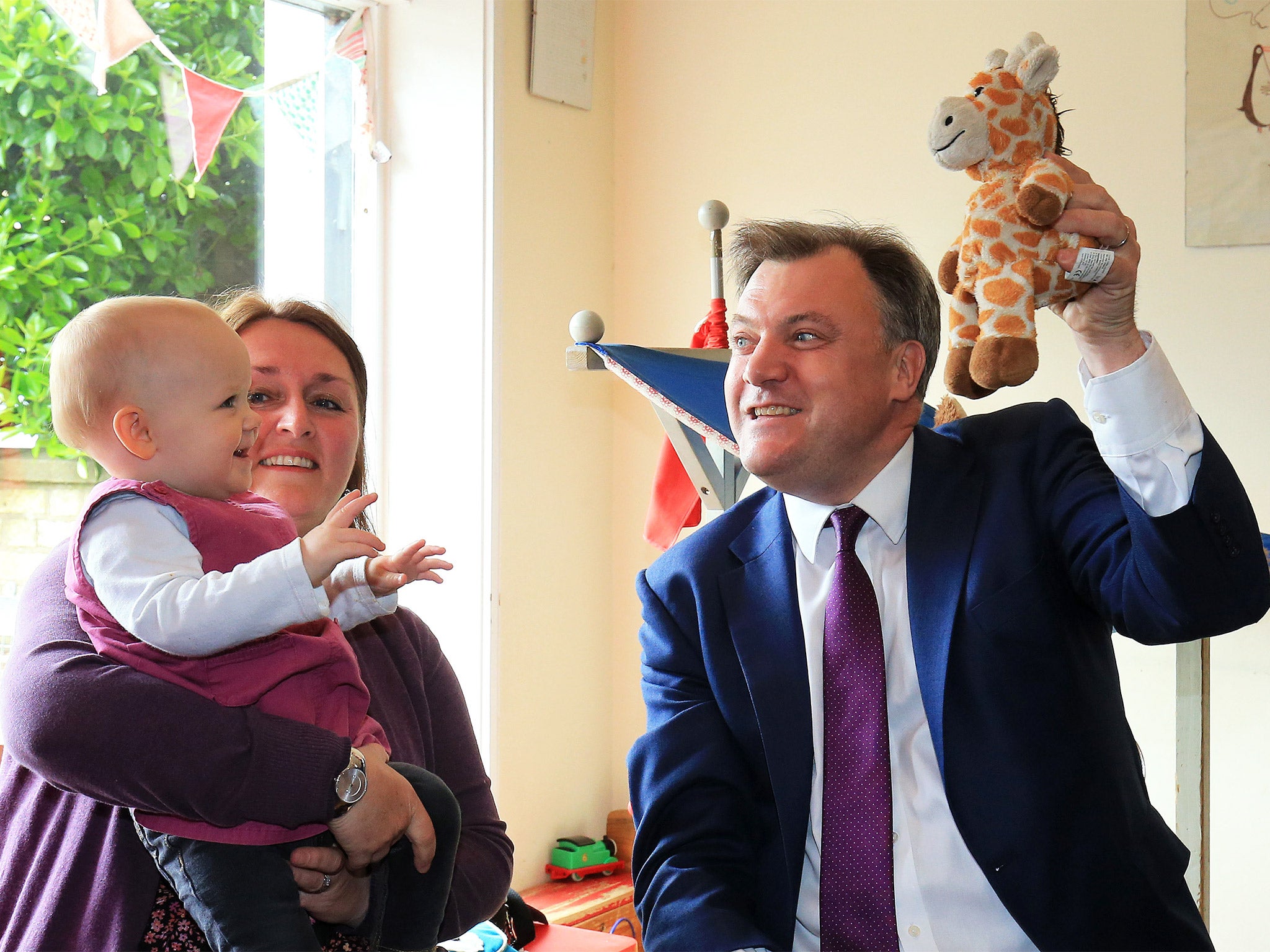 'You're having a giraffe': shadow chancellor Ed Balls meets children and parents at a bookshop in Hove, East Sussex, on Wednesday