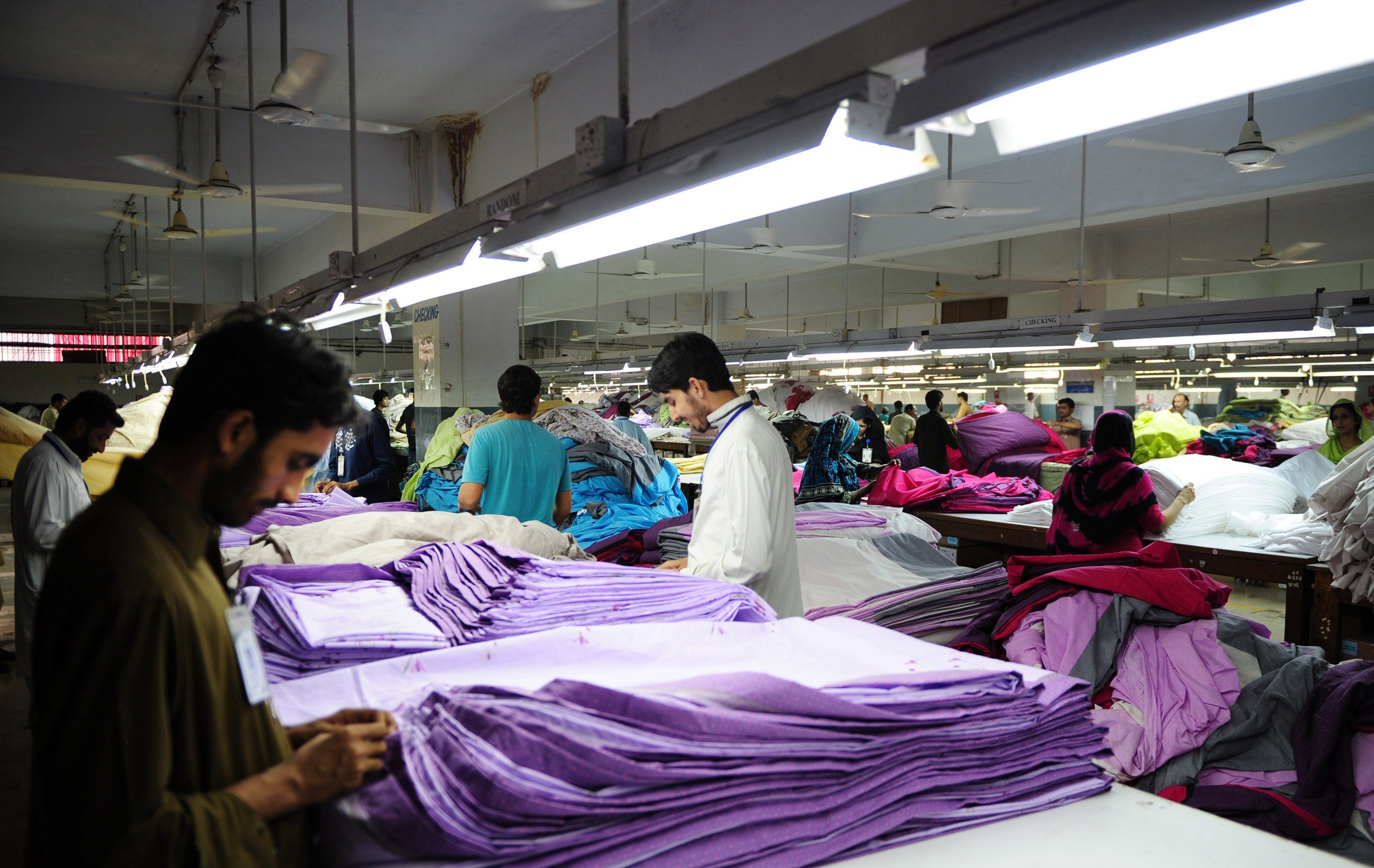 Workers in a Pakistani garment factory.