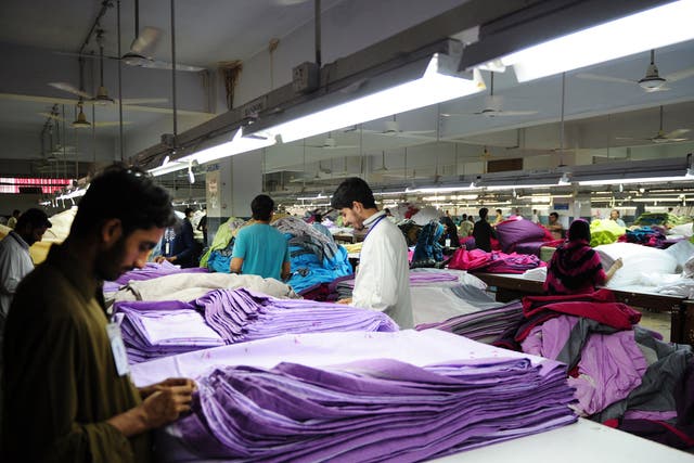 Workers in a Pakistani garment factory.