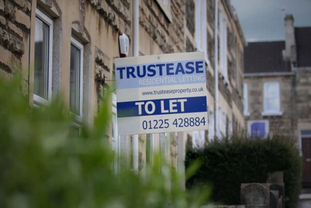 A 'To Let' letting sign is seen displayed outside a rental property