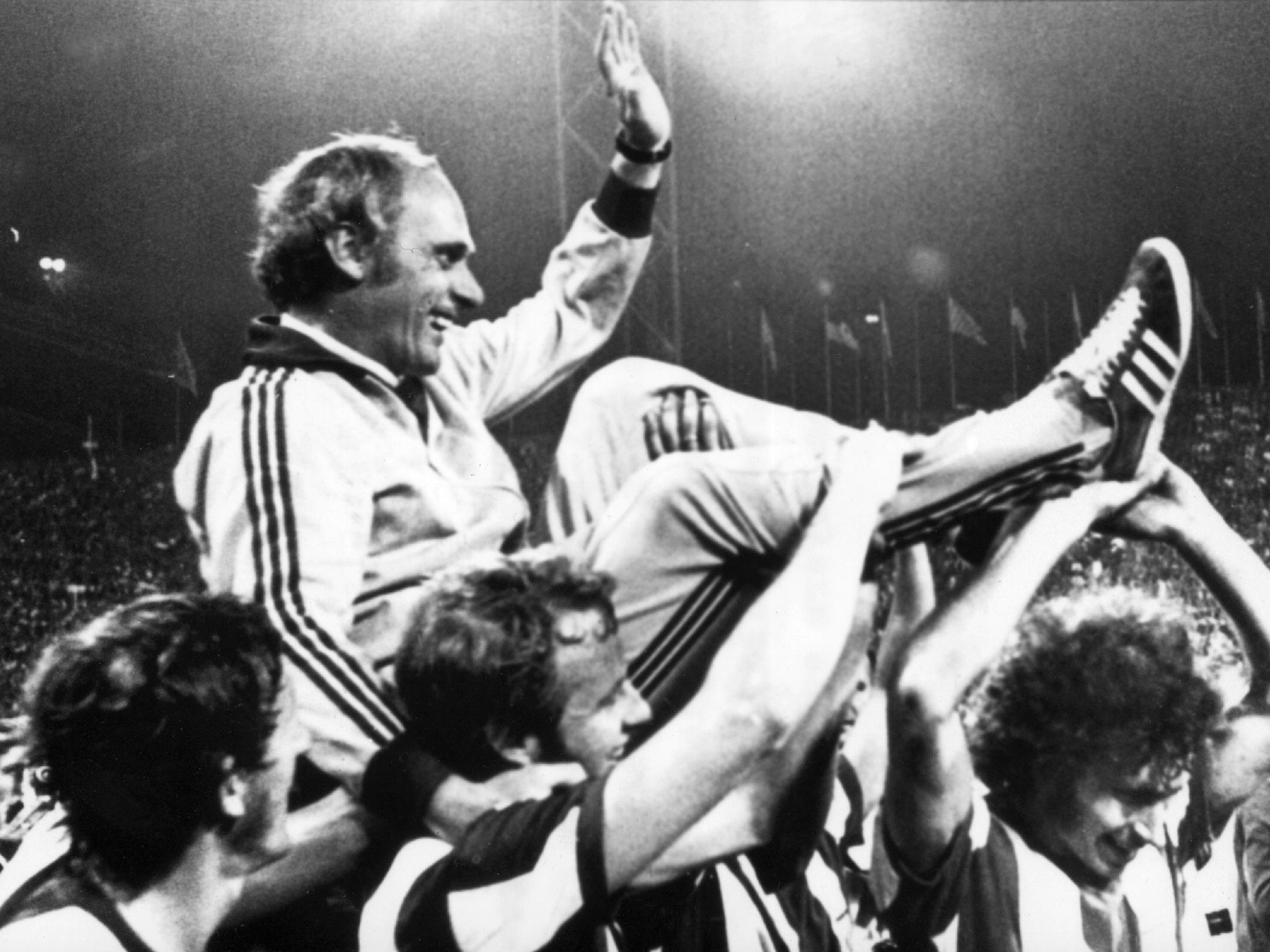 Lattek is carried off the pitch by his players in 1972 after Bayern Munich had won the Bundesliga title