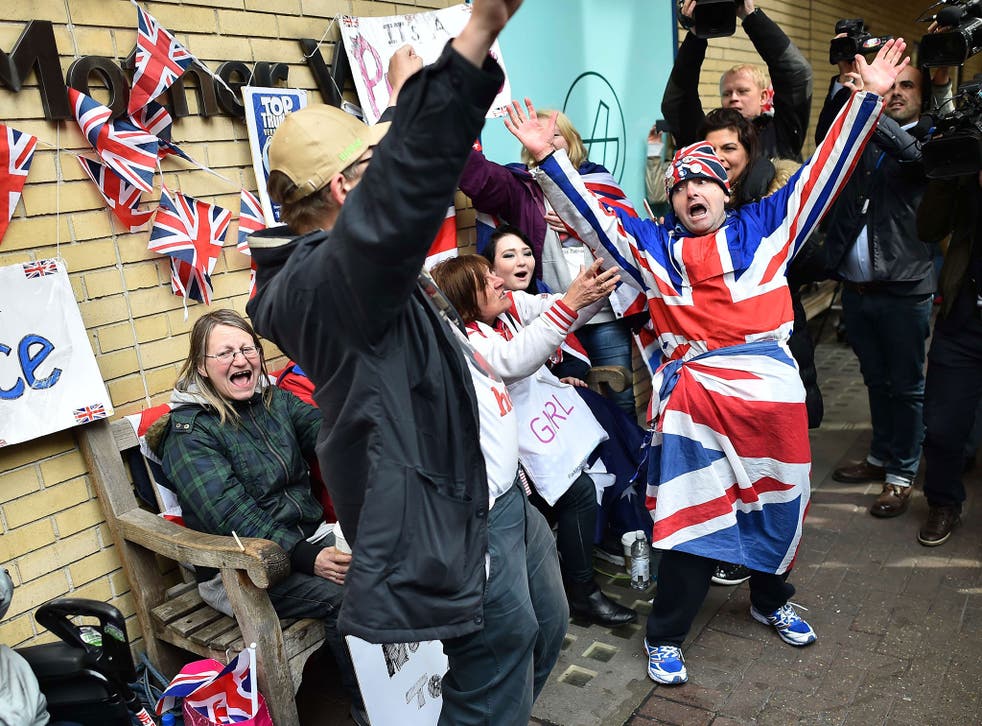 Royal supporters celebrate outside St Mary's hospital in west London