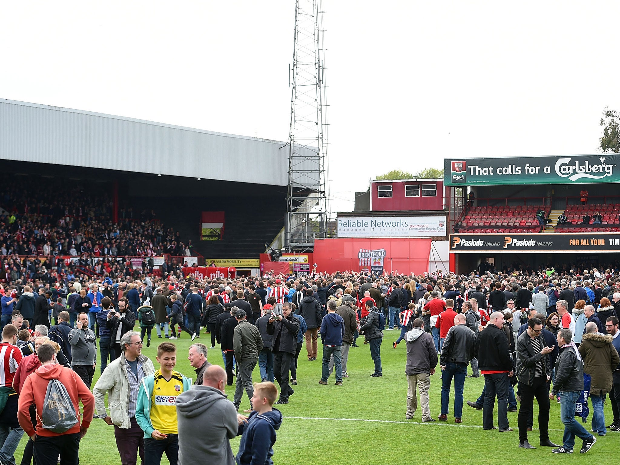 Brentford fans celebrate the 3-0 win over Wigan