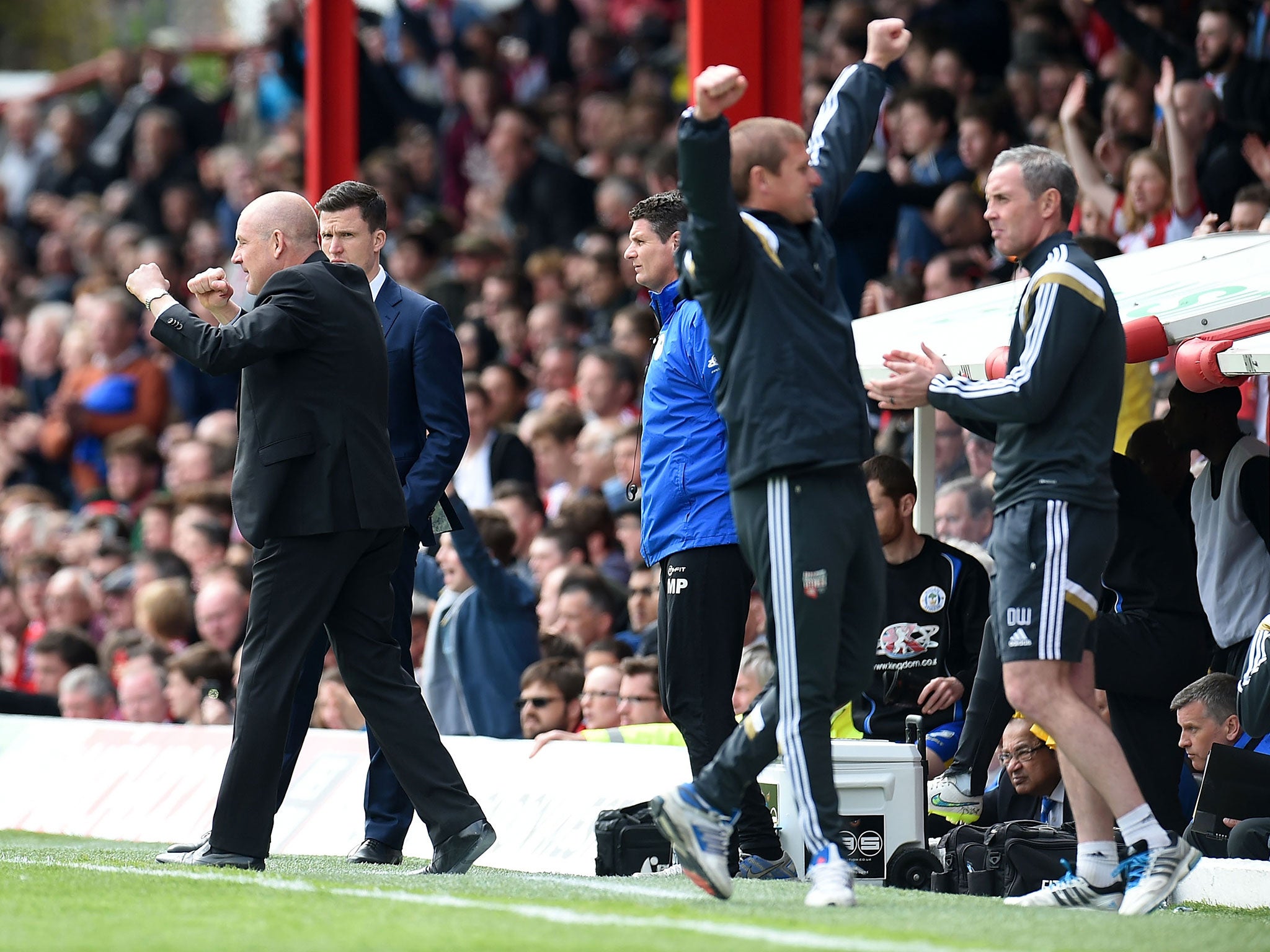 Mark Warburton leads the celebrations as Brentford reach the Championship play-offs