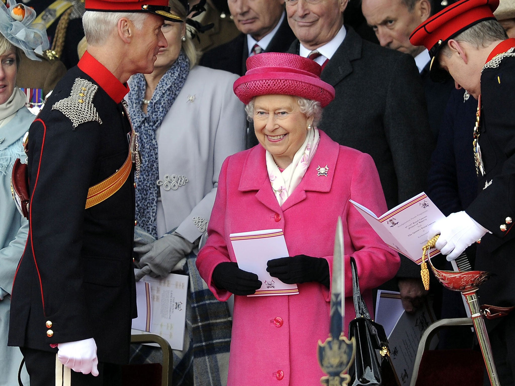 Britain's Queen Elizabeth II smiles during a visit to Richmond Castle to attend the amalgamation parade of The Queen's Royal Lancers and 9th/12th Royal Lancers, in Richmond, England Saturday May 2, 2015