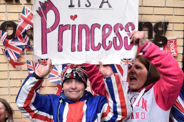 Royal fans celebrate outside the Lindo wing at St Mary's hospital after the news is passed that the second royal baby is a girl 