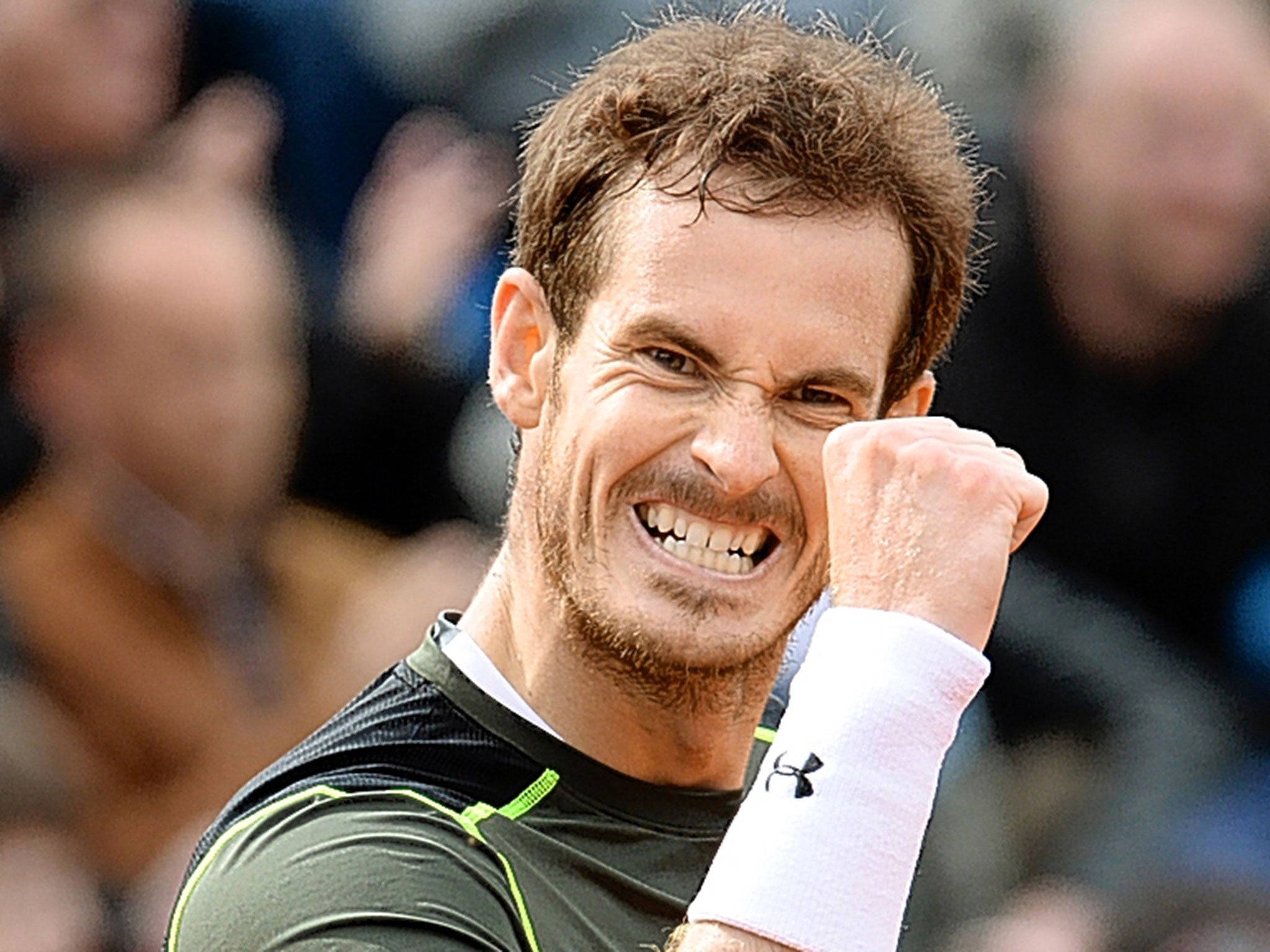 Andy Murray celebrates victory over Lukas Rosol