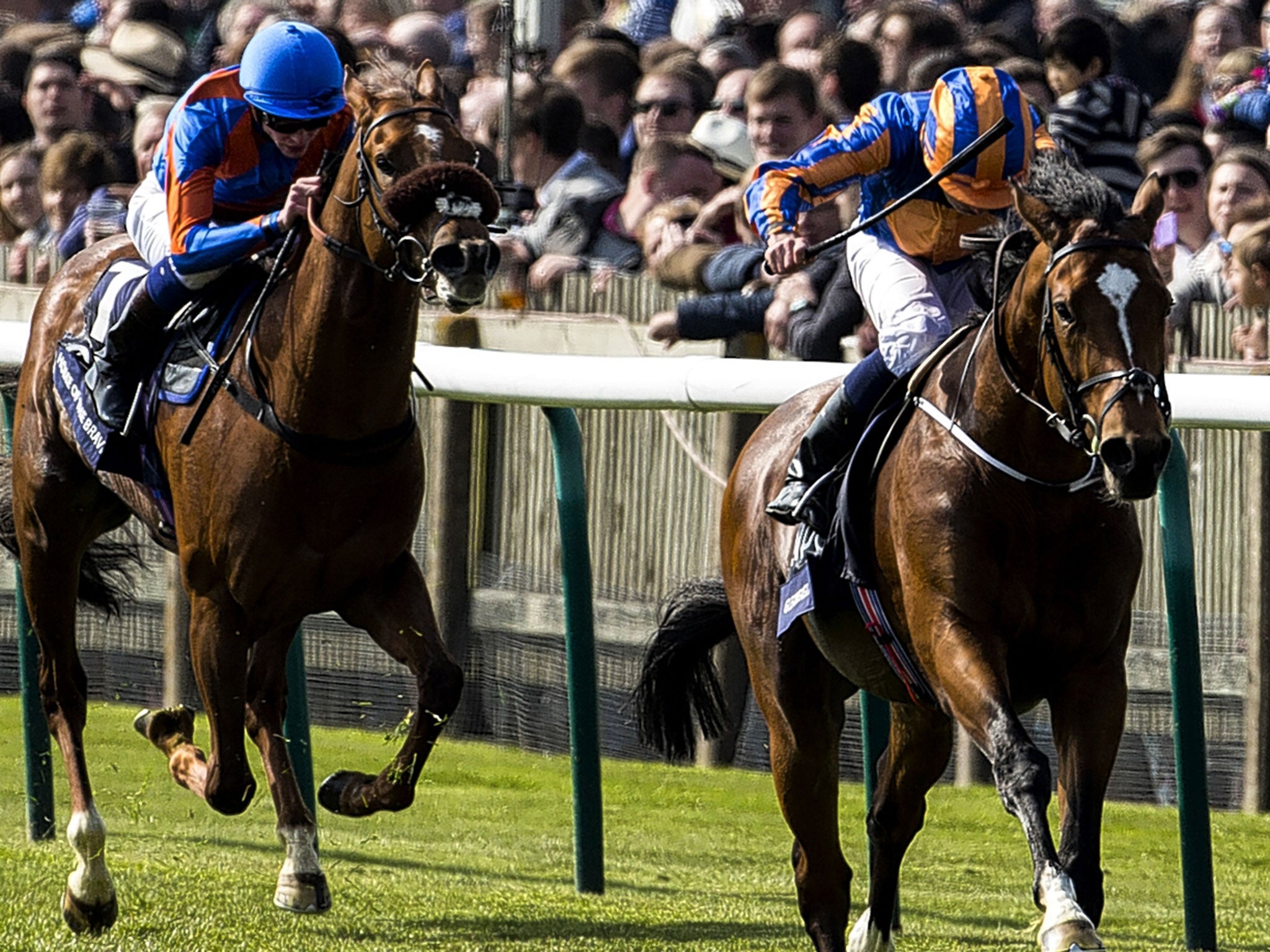 Classic display: Ryan Moore shows his style as he pilots Gleneagles (right) to the finish post in the 2000 Guineas