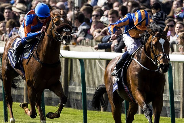 Classic display: Ryan Moore shows his style as he pilots Gleneagles (right) to the finish post in the 2000 Guineas