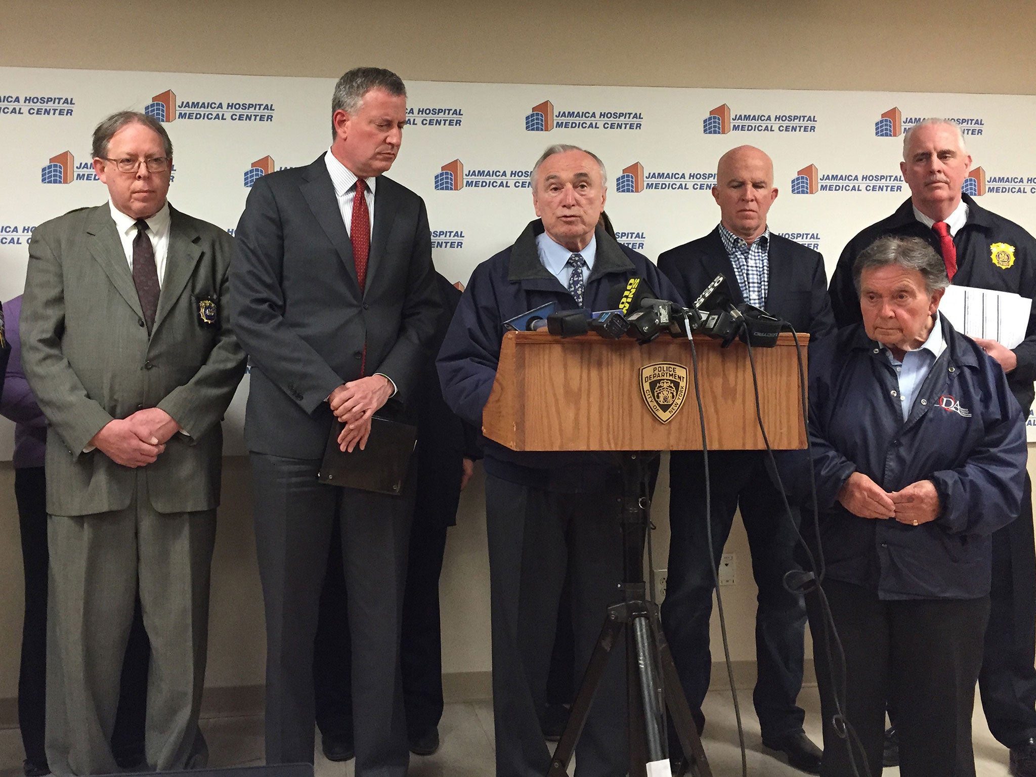 Mayor Bill de Blasio (second from left) and Police Commissioner William Bratton (centre) speak at a news conference Saturday night, May 2, 2015