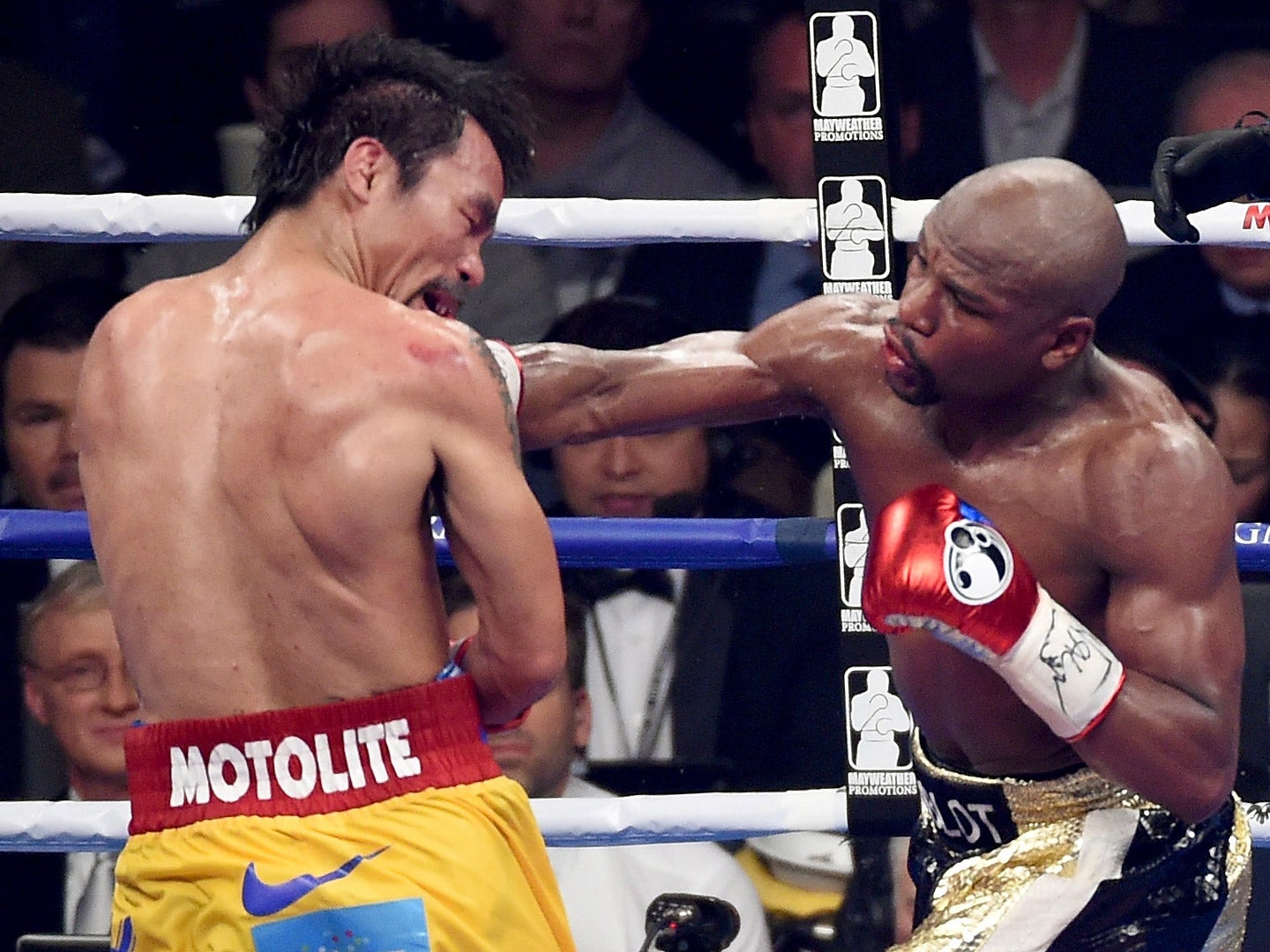 Floyd Mayweather lands a punch on Manny Pacquiao in Saturday night's fight