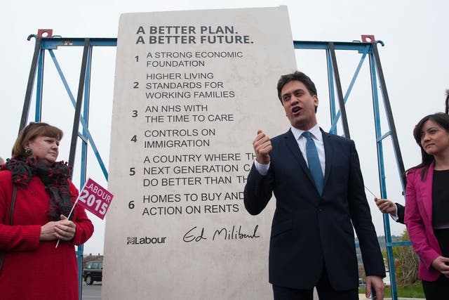Labour leader Ed Miliband unveils Labour's pledges carved into a stone plinth in Hastings