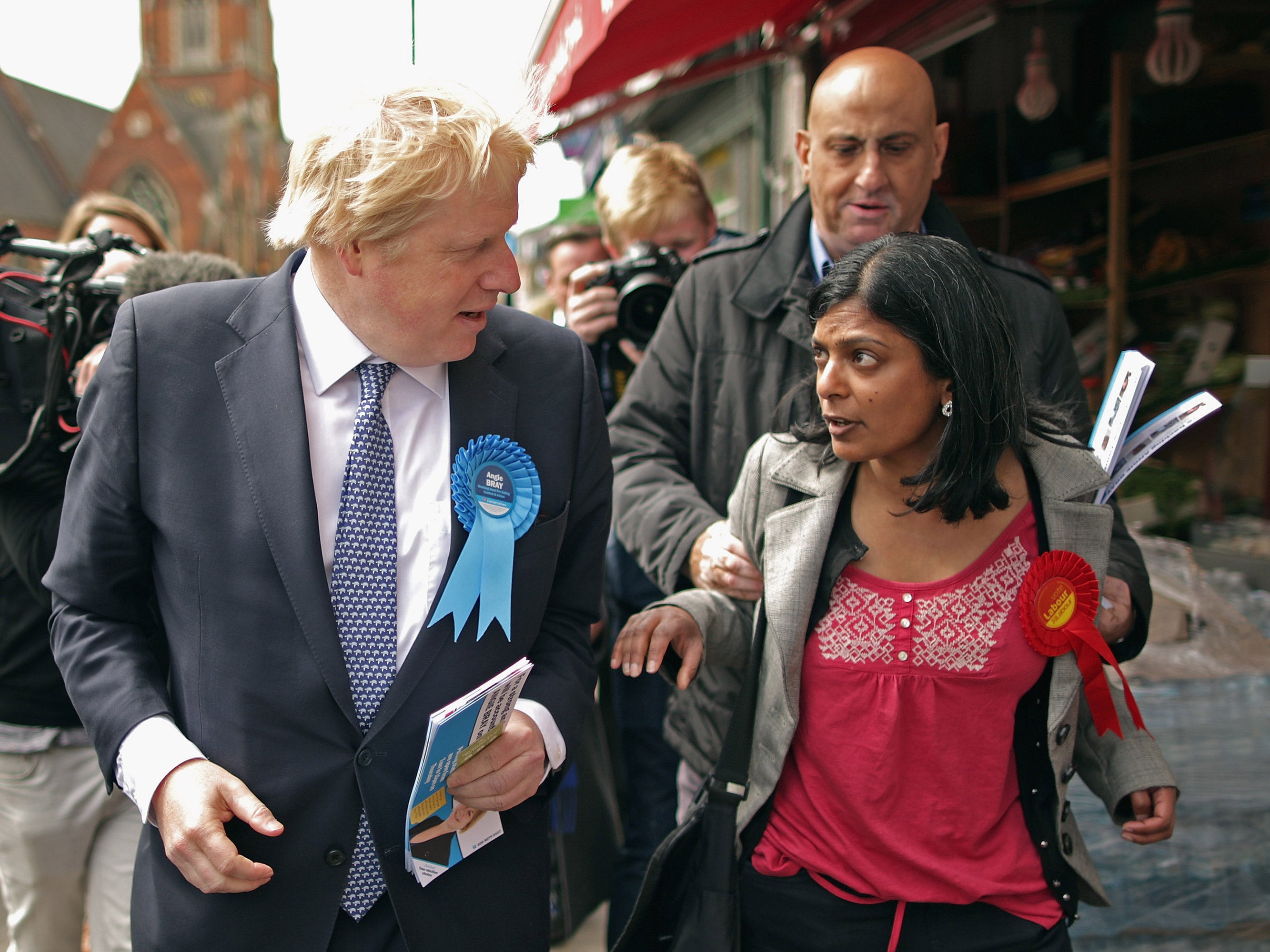 Labour candidate Rupa Huq is manhandled by a Tory activist during the election campaign in Ealing Central and Acton