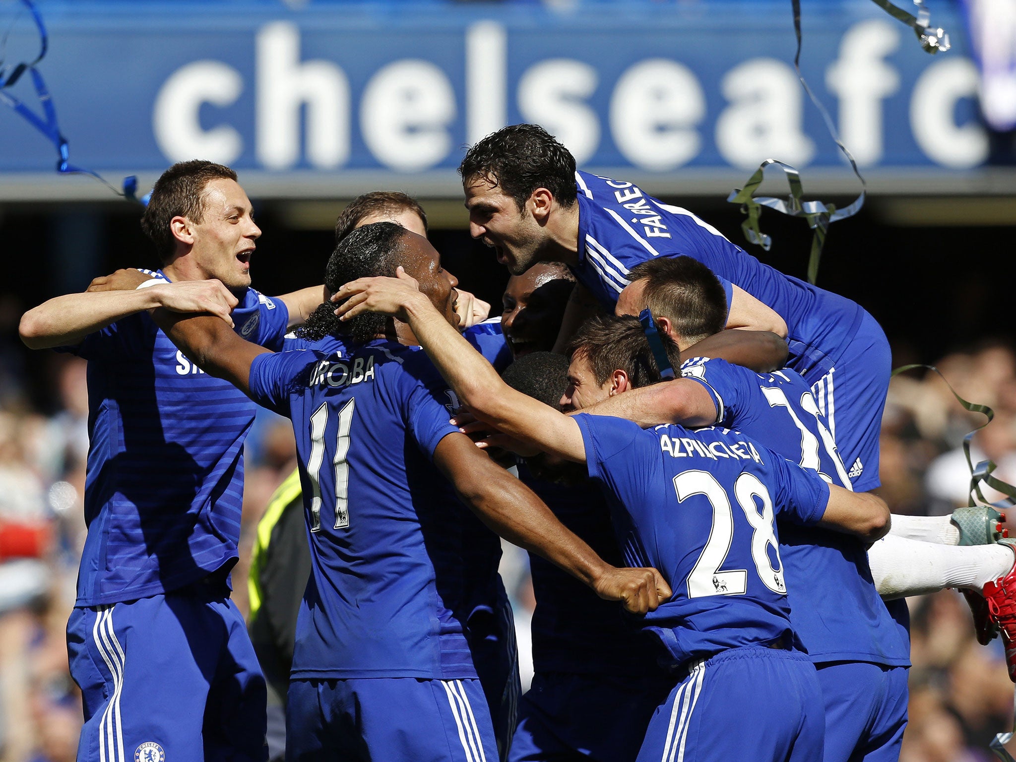 Chelsea players celebrate winning the Premier League title