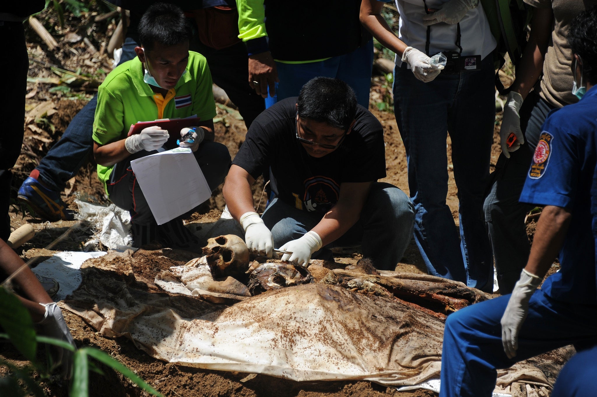 26 bodies, believed to be those of Rohingya asylum seekers who fled persecution in Myanmar, were found at the abandoned camp