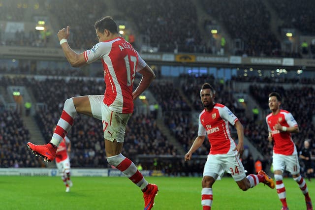 Alexis Sanchez and Arsenal are trying to hold off Man City's surge