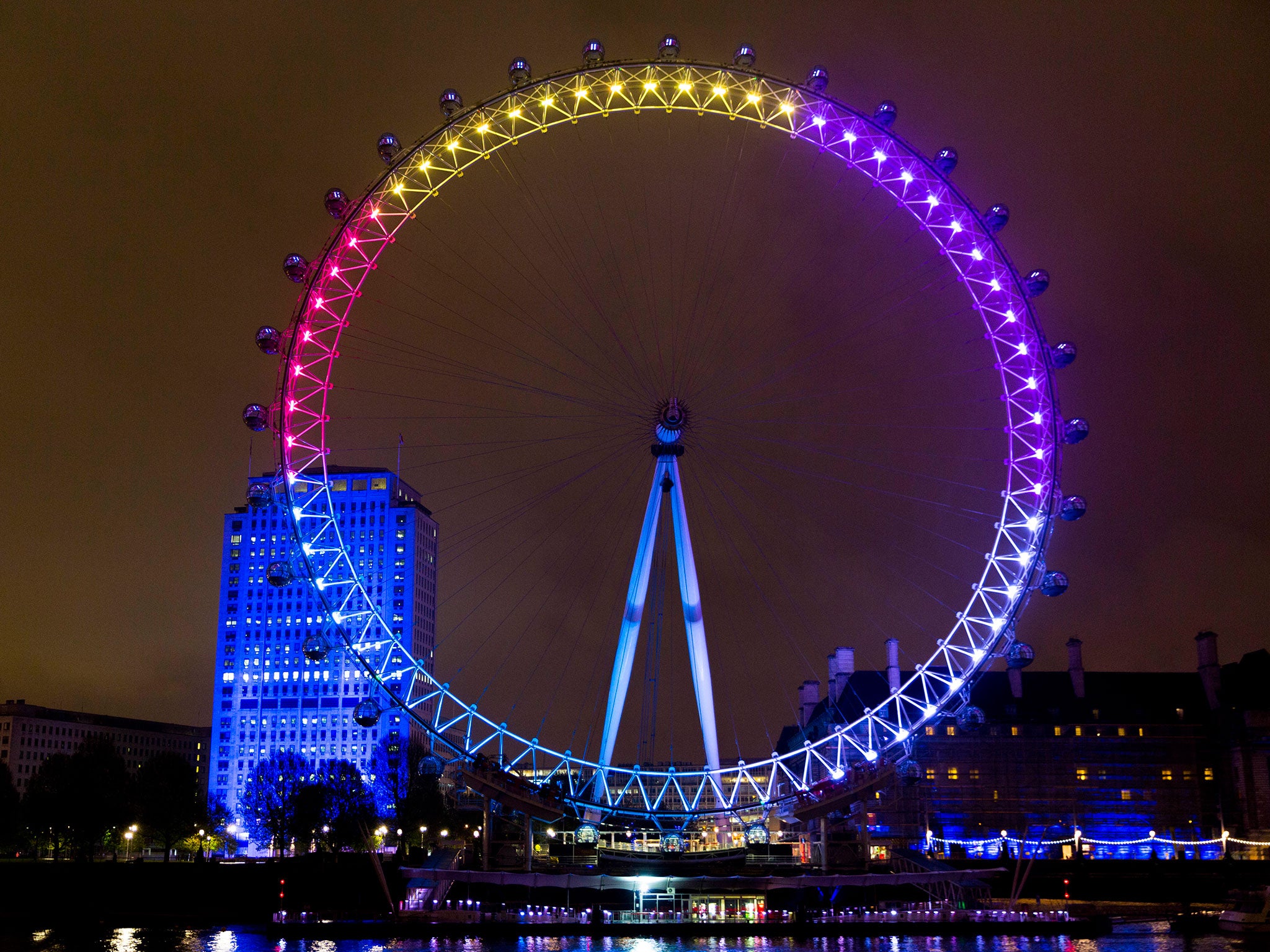 Facebook lights up the London Eye with the nation's general election conversations.The London Eye showed the top five most discussed political topics on Facebook. (Colours: Economy - white; Health - purple; Tax - yellow; Europe and Immigration - blue; Cri