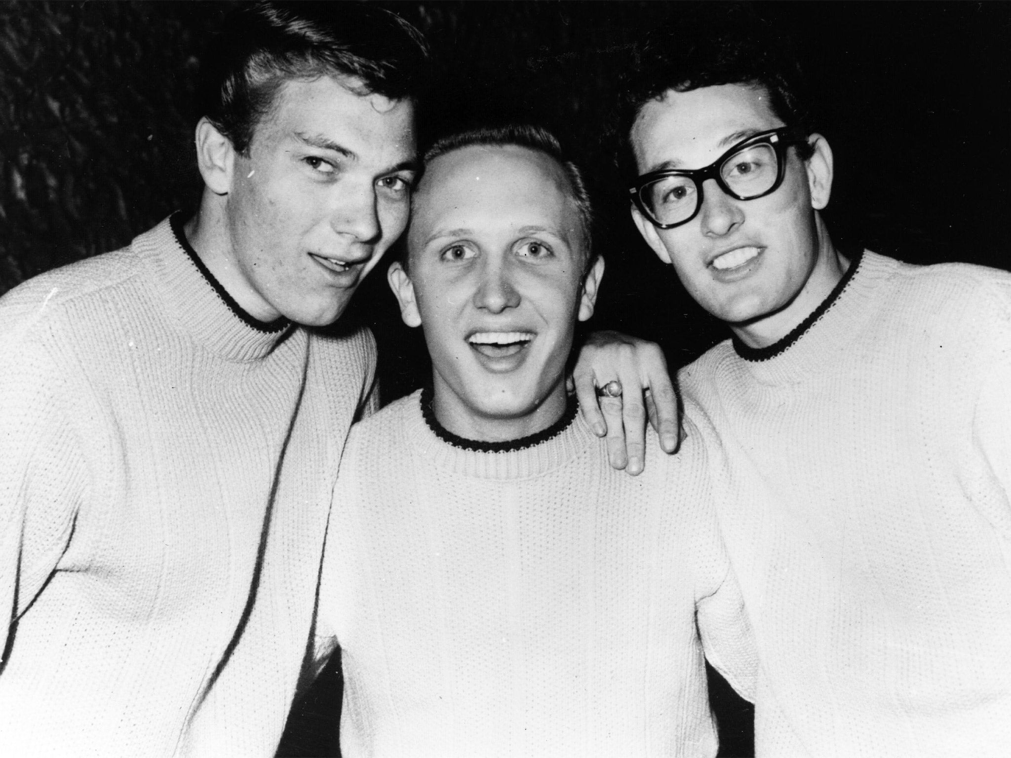 Buddy Holly in 1957 with two of his fellow Crickets – Jerry Allison (left) and Joe B Mauldin (Getty)