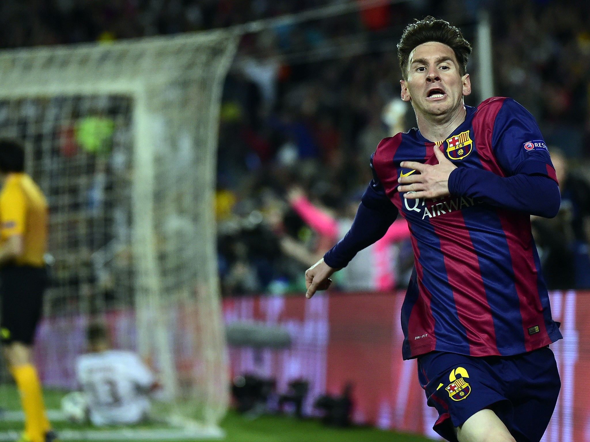 Lionel Messi celebrates one of his two goals