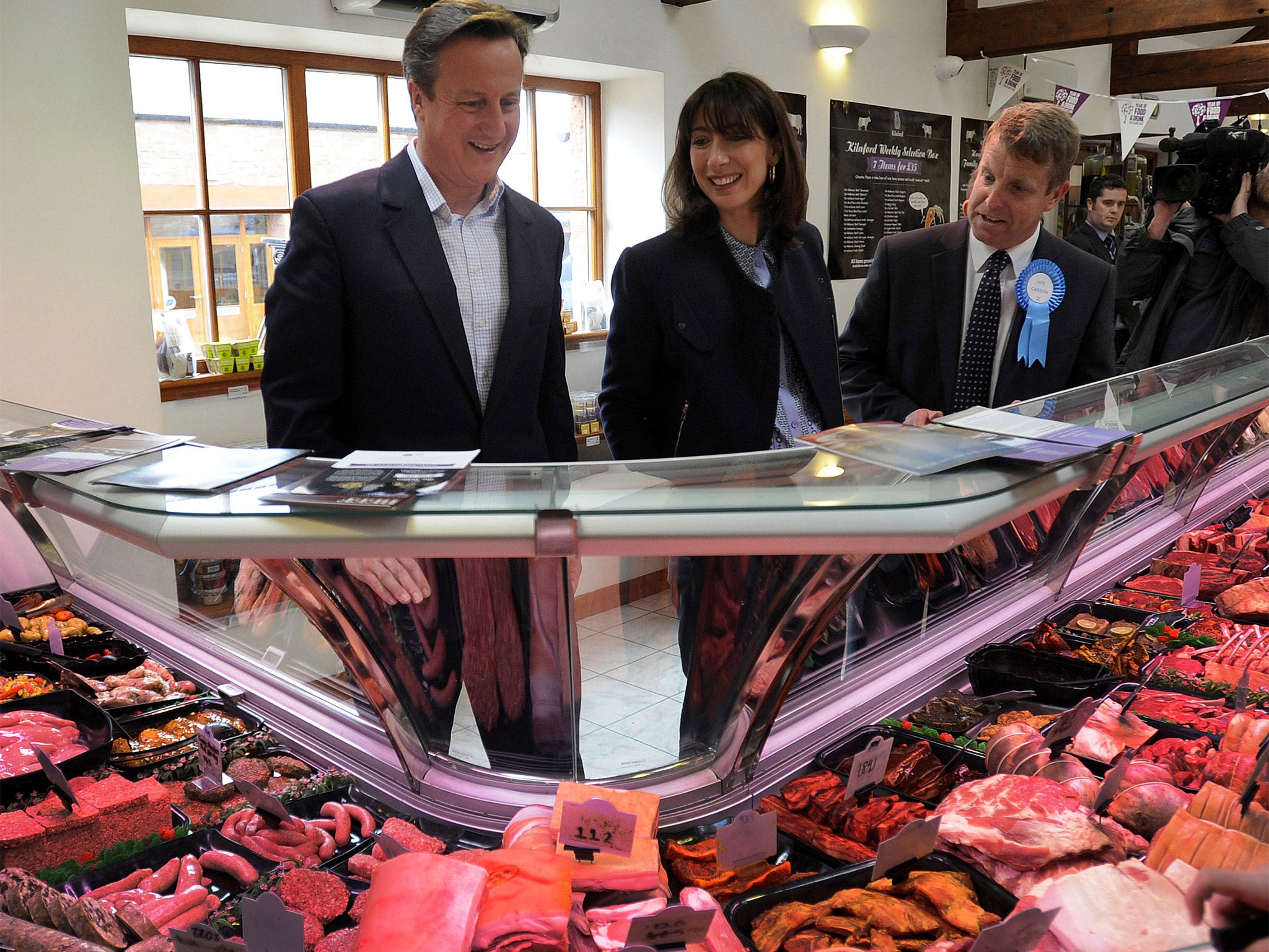 David and Samantha Cameron visiting a farm shop in Dumfries, Scotland, on Wednesday (Getty)