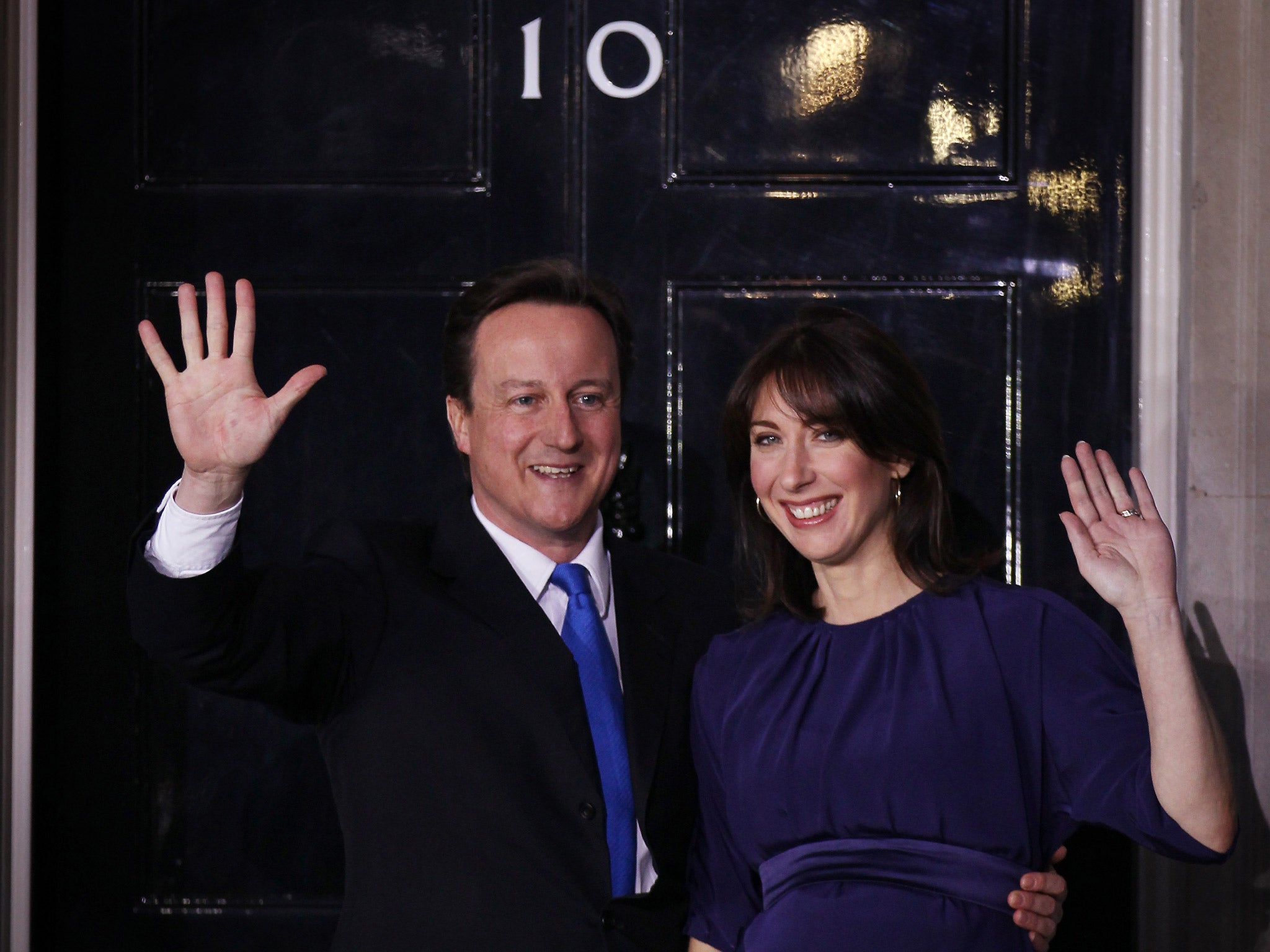 David Cameron and his wife wave as they enter 10 Downing Street five years ago (Getty)