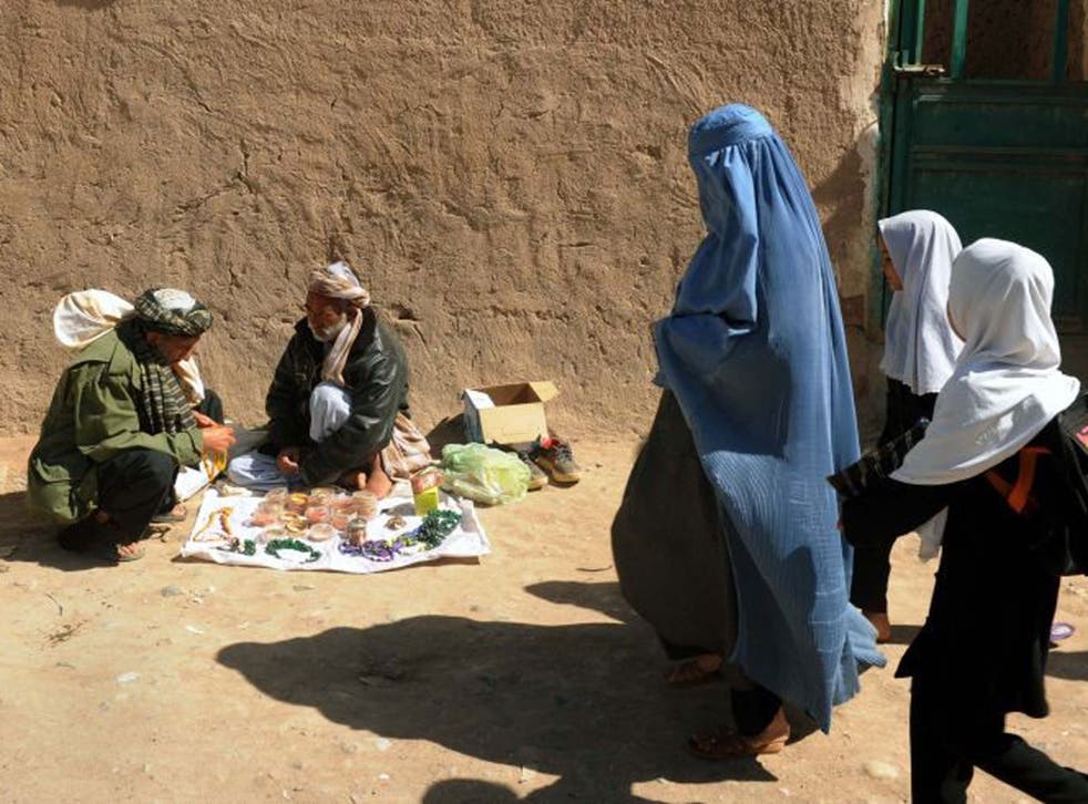 'We respect your culture': an Afghan woman in the old part of Herat city, 2013