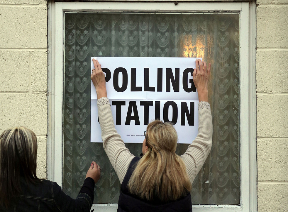 A polling station sign is put up outside Sutton village hall in Doncaster, as Britain goes to the ballot box today, Thursday 7 May 2015