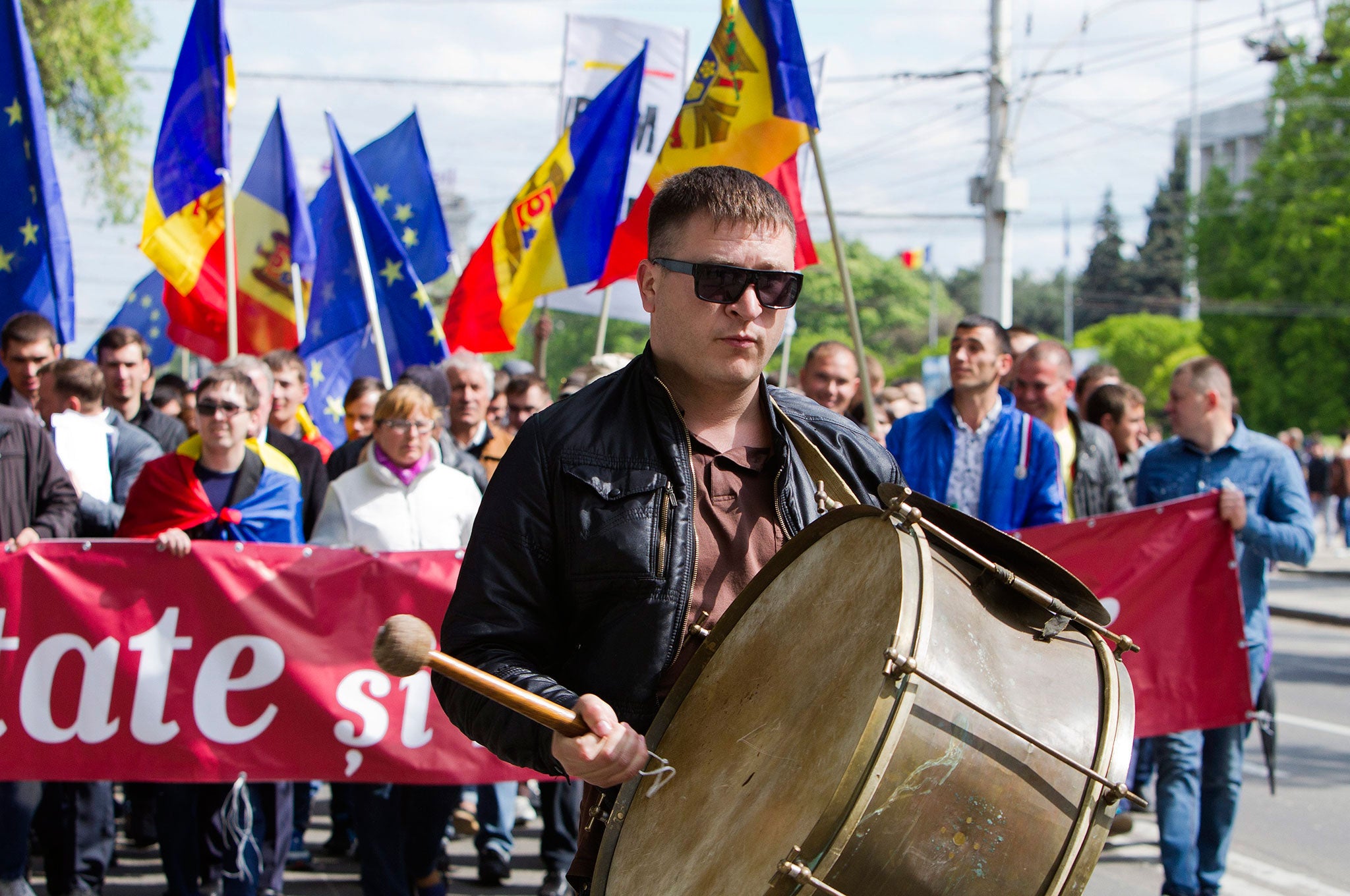 People join a protest at the Big Square of the National Assembly, in Chisinau, Moldova